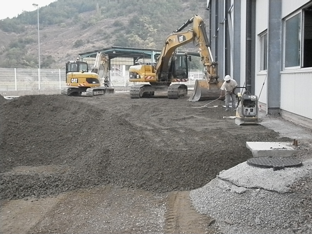 Mise en oeuvre d'une couche de fondation en GNT traité à Umicore